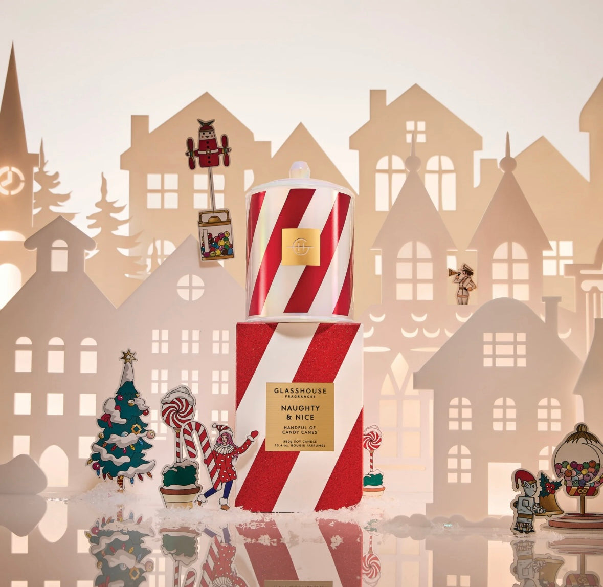 NAUGHTY &amp; NICE
HANDFUL OF CANDY CANES
380g Candle